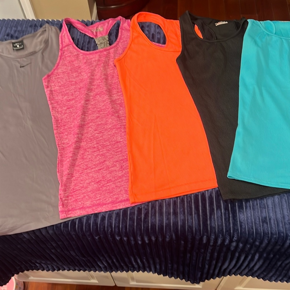 Bundle of 6 Athletic Tanks:1 Nike Pro,1 Nike, 2 Under Armor, 1 Adidas and 1 Head
